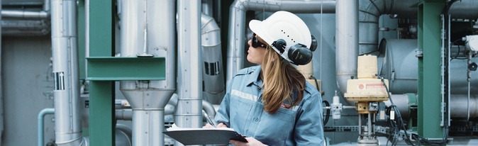 Female engineer in factory, CO2 treatment unit at an environmental project at the Kwinana site, Western Australia.